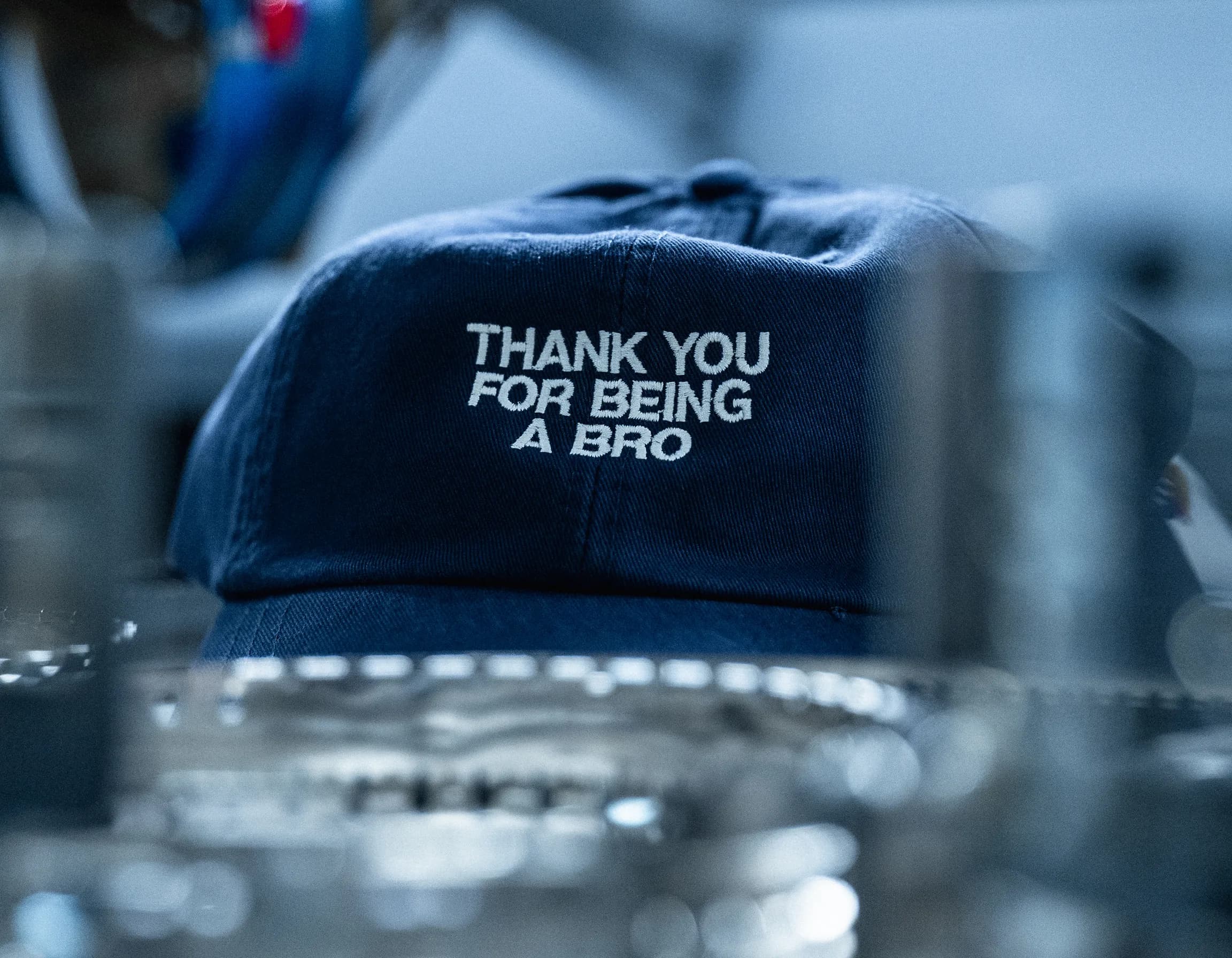 Navy Thank You for Being a Bro cap fresh off the embroidery machine at Elite Custom Apparel